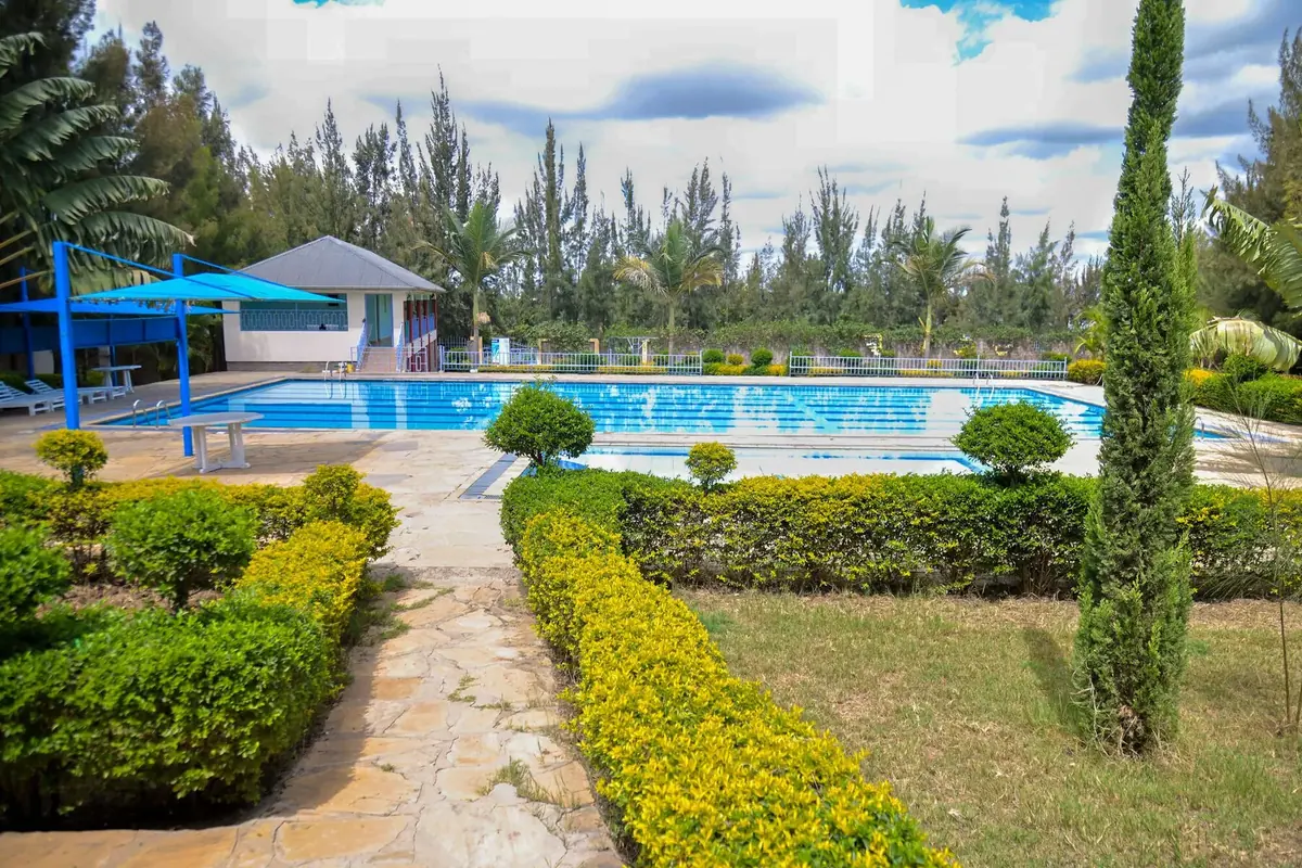 The swimming pool and campus gardens